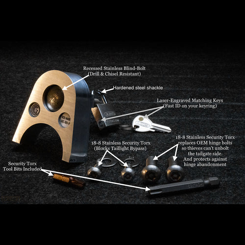 4th Gen Toyota Tacoma tailgate lock kit components. 6061-T6 aluminum block, ABUS padlock, stainless steel security Torx bolts, and matching keys.